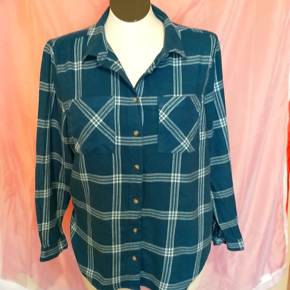 Long sleeve button up Flannel shirt.